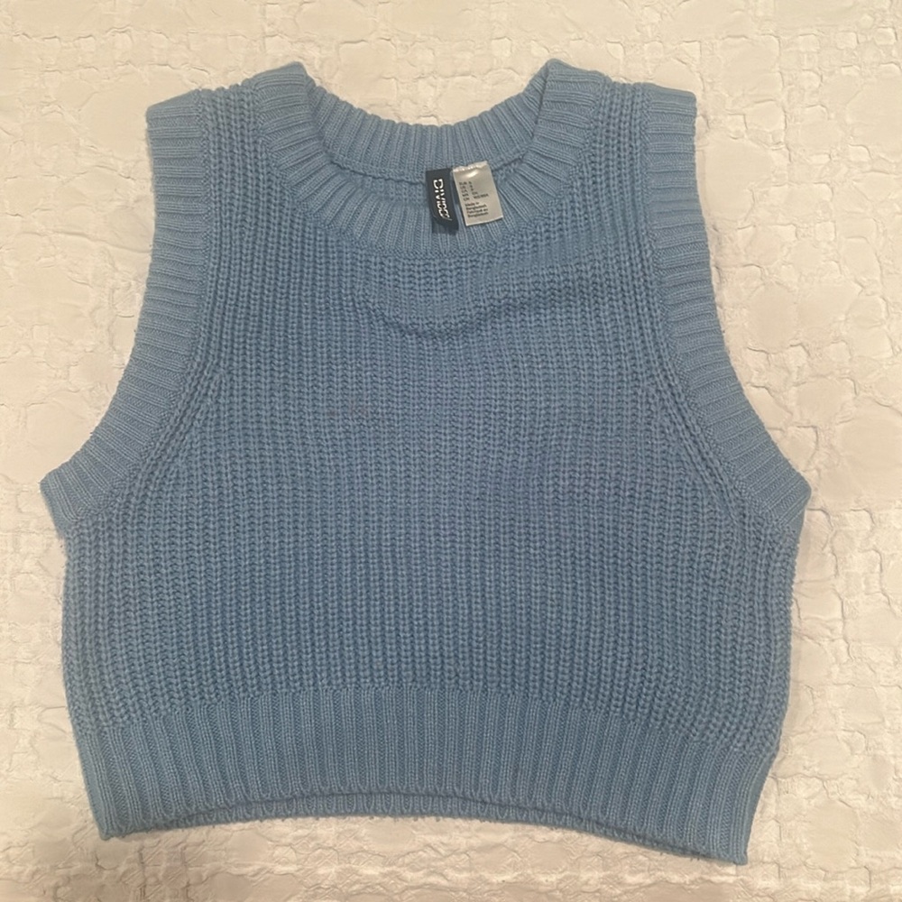 Blue knitted sweater vest